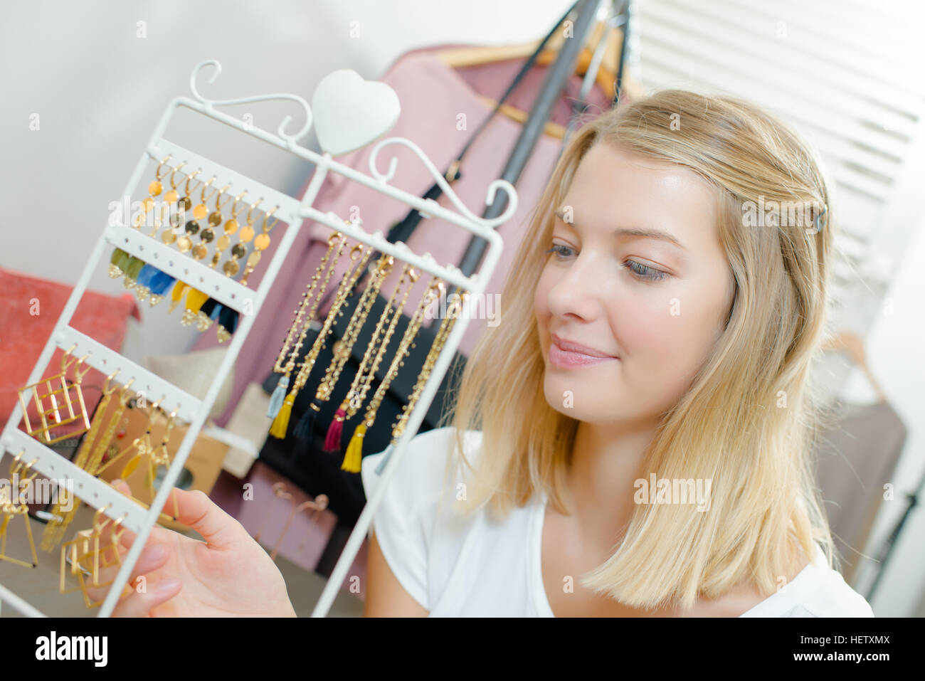 The jewellery has caught her attention Stock Photo Alamy