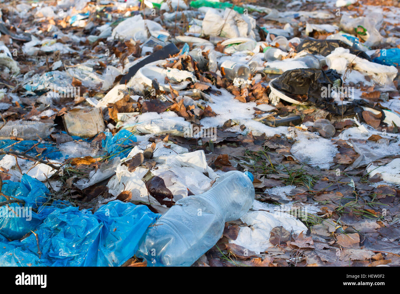 Pile of plastic bags and other refined petroleum products dumped in