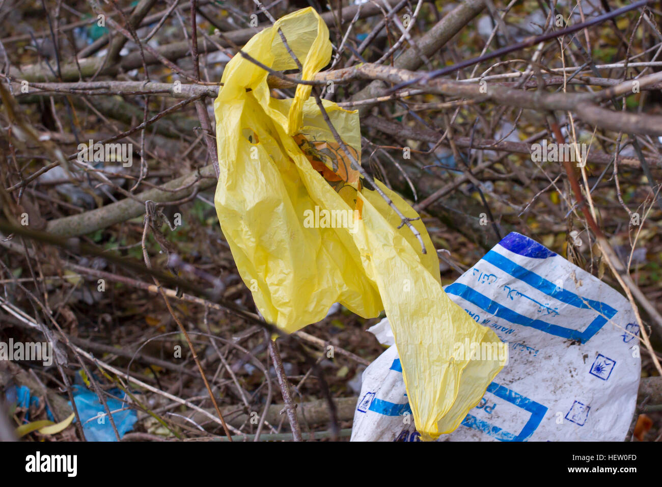 Pile of plastic bags and other refined petroleum products dumped in