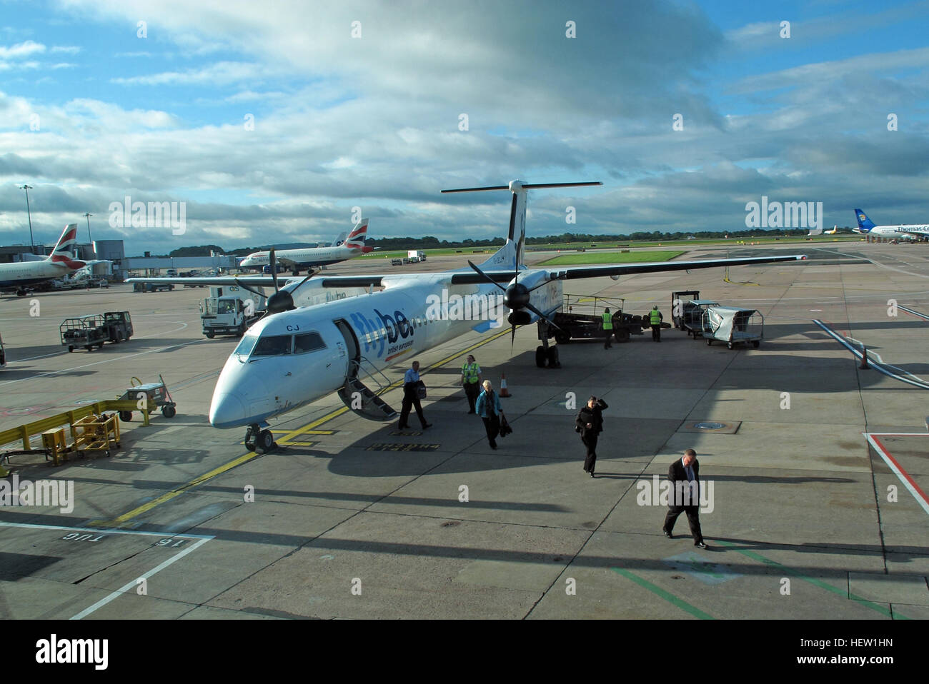 Flybe air plane G-JECJ Bombardier Dash-8 Q400 arriving Manchester Ringway Airport, England, UK Stock Photo