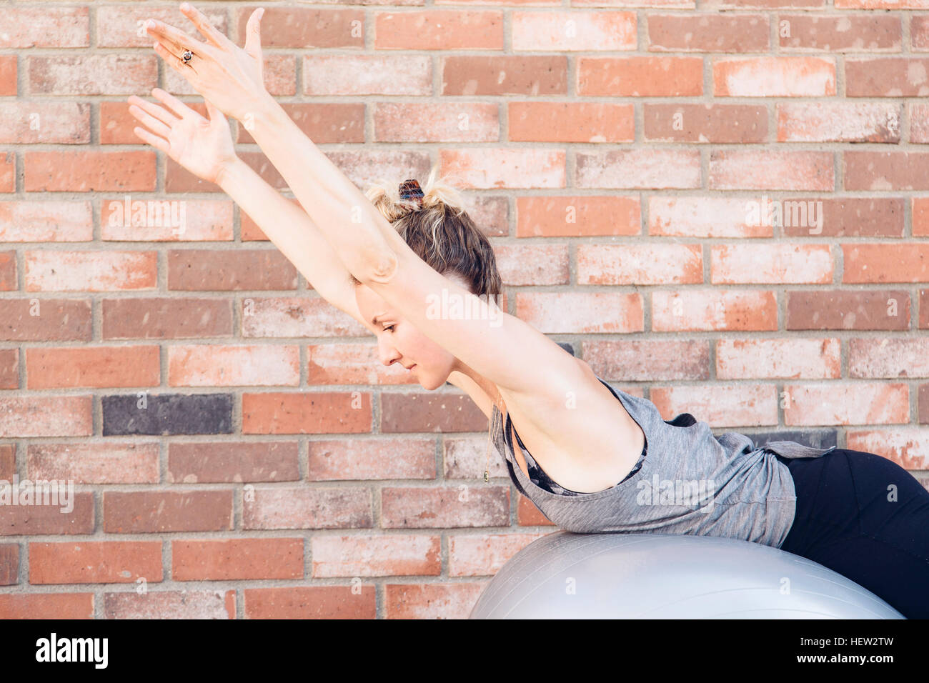 Woman using exercise ball Stock Photo Alamy