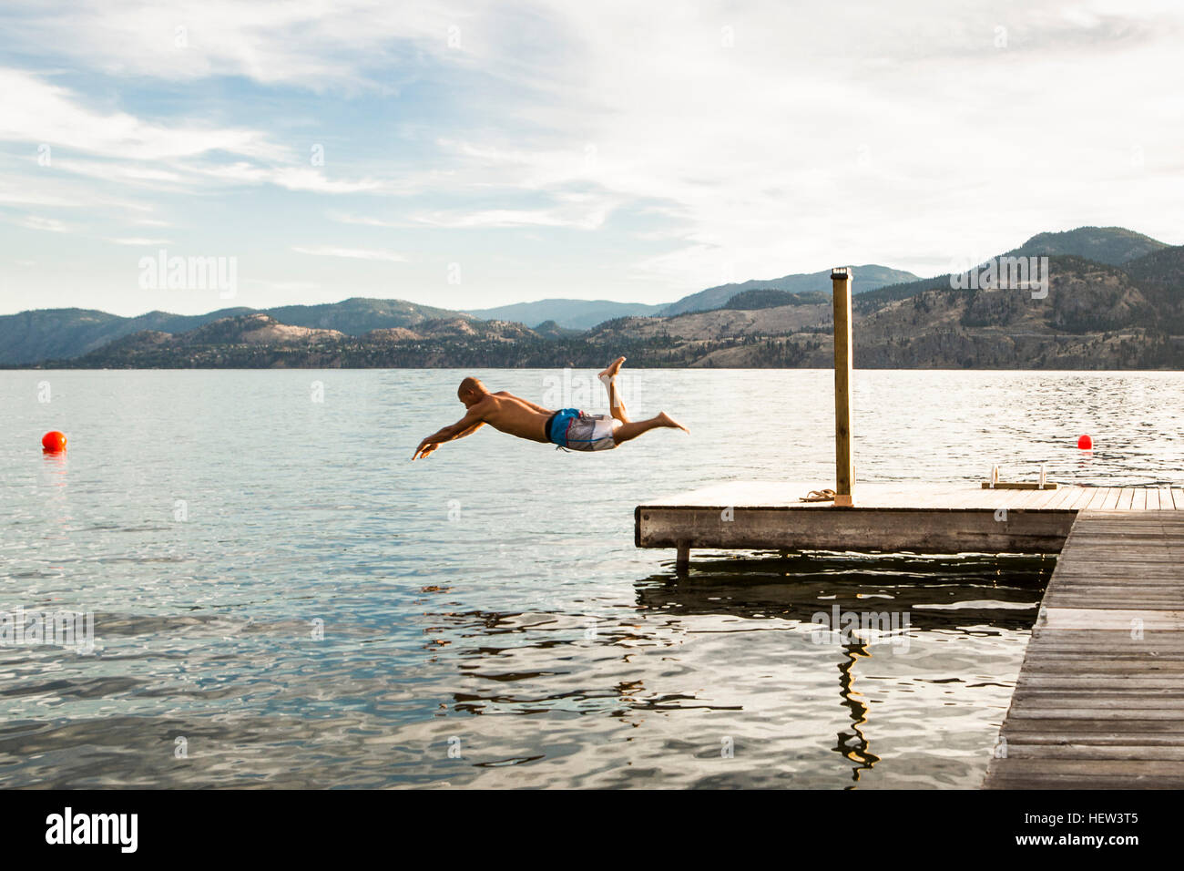 Man diving into lake, Penticton, Canada Stock Photo Alamy