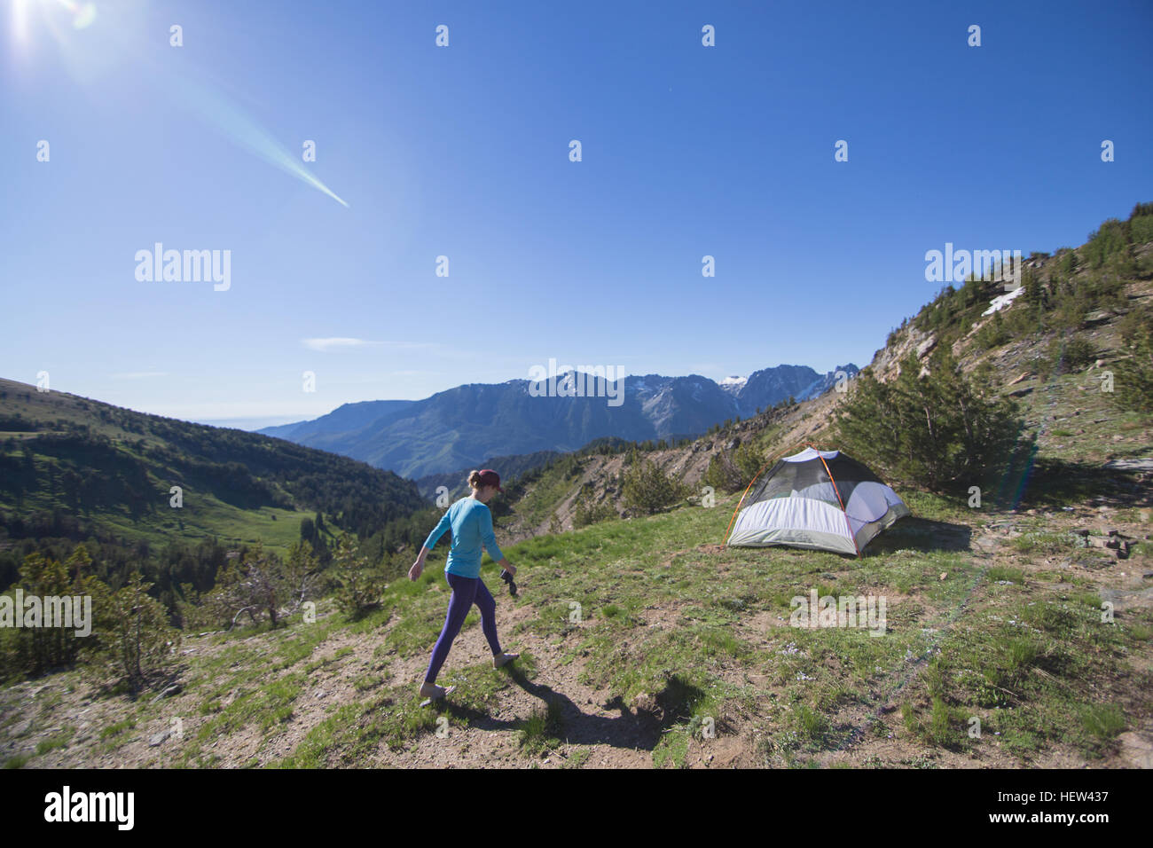 Hiker camping on hilltop, Enchantments, Alpine Lakes Wilderness, Washington, USA Stock Photo