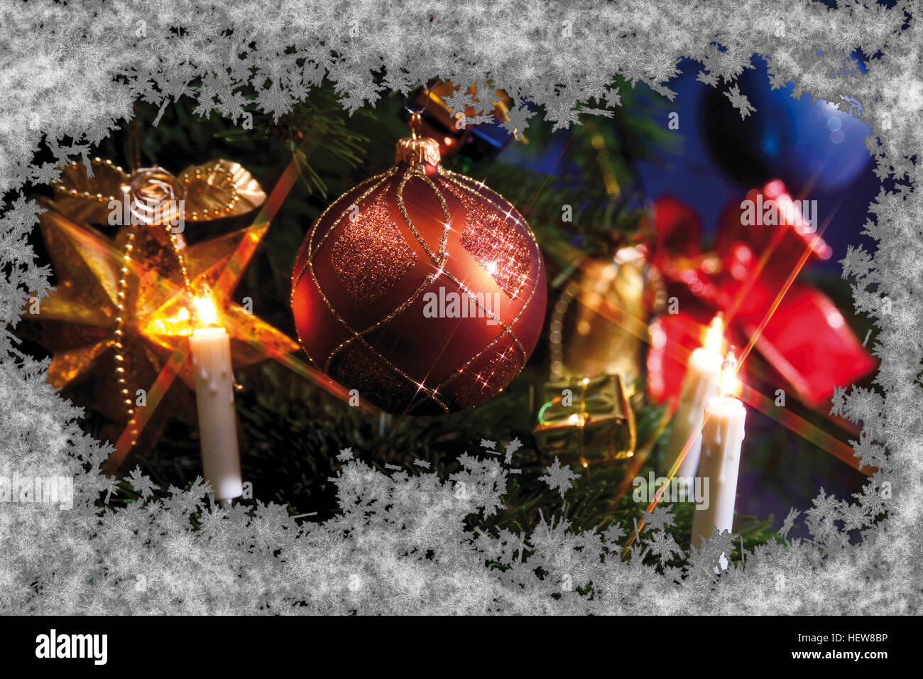 Detail of a decorated Christmas tree viewed through a frosted glass pane Stock Photo