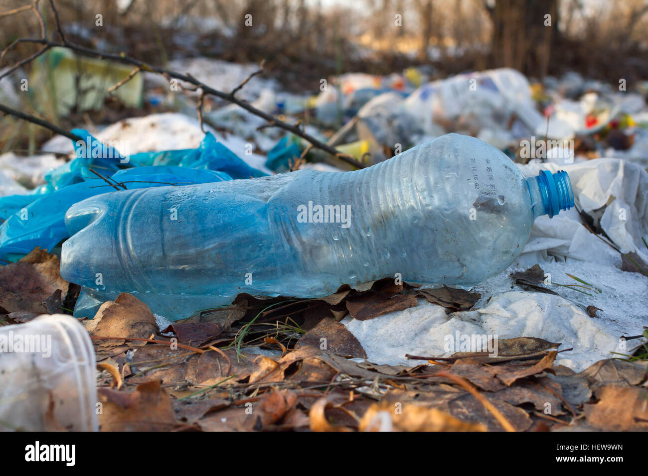 Pile of plastic bags and other refined petroleum products dumped in