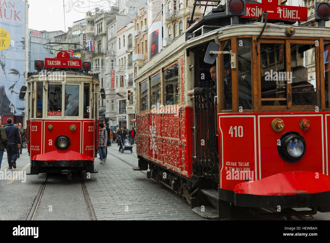 Nostalgic trams in Istiklal Street ride between Taksim and Tunnel square in istanbul Stock Photo
