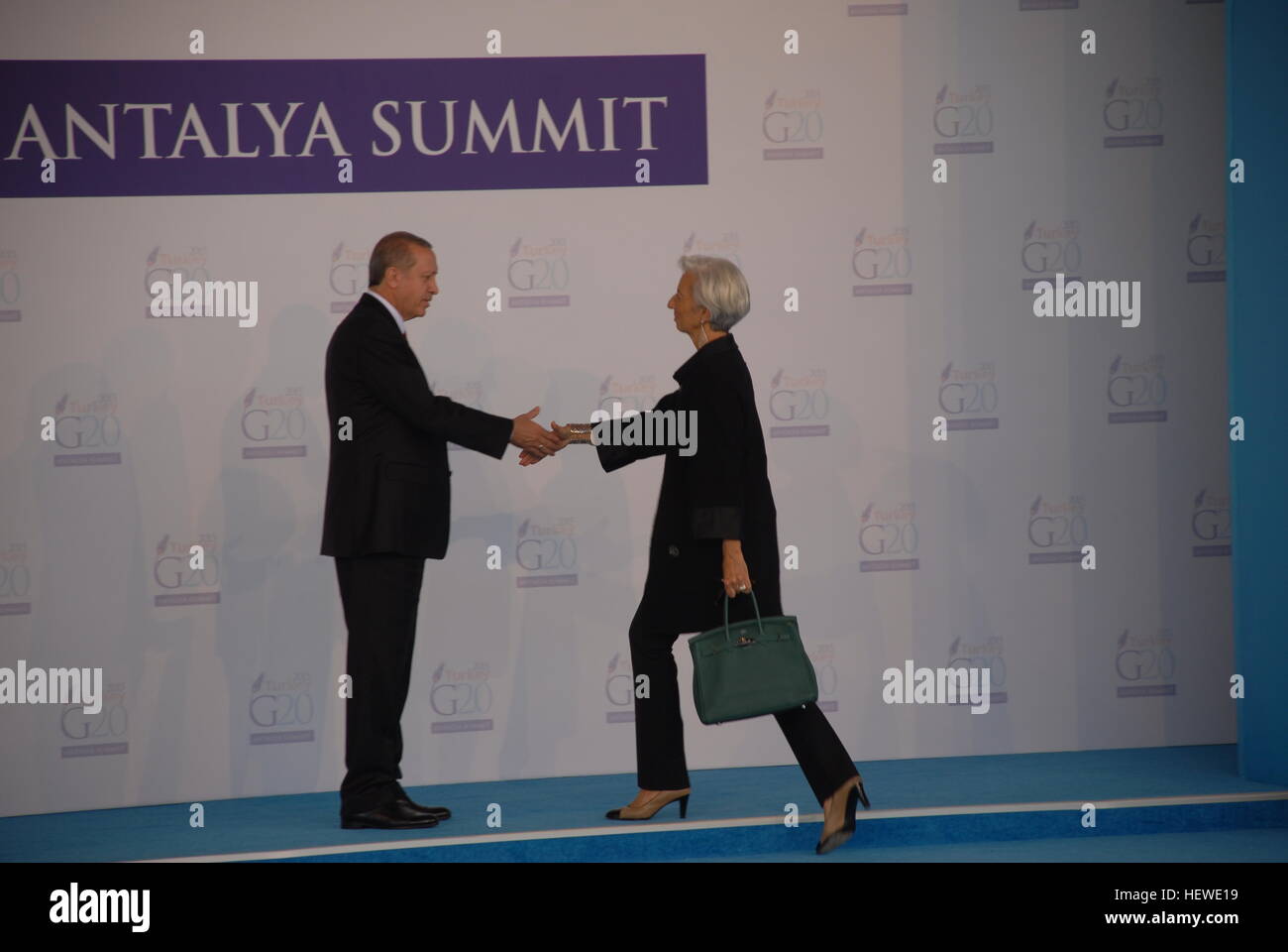 Turkish President Recep Tayyip Erdogan greets Christine Lagarde, Managing Director of the IMF at the G20 summit. Stock Photo
