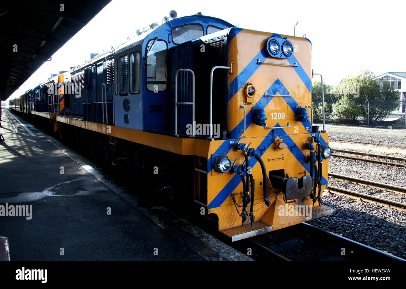 The New Zealand DJ class locomotive is a type of diesel-electric locomotive in service on the New Zealand rail network. The class were built by Mitsubishi Heavy Industries and introduced from 1968—1969 for the New Zealand Railways Department with a modernisation loan from the World Bank to replace steam locomotives in the South Island, where most of the class members worked most of their lives.  They are the second class of locomotive in New Zealand to utilise the Bo-Bo-Bo wheel arrangement, the other classes being the EW class and the EF class. In both cases, this wheel arrangement was used t Stock Photo