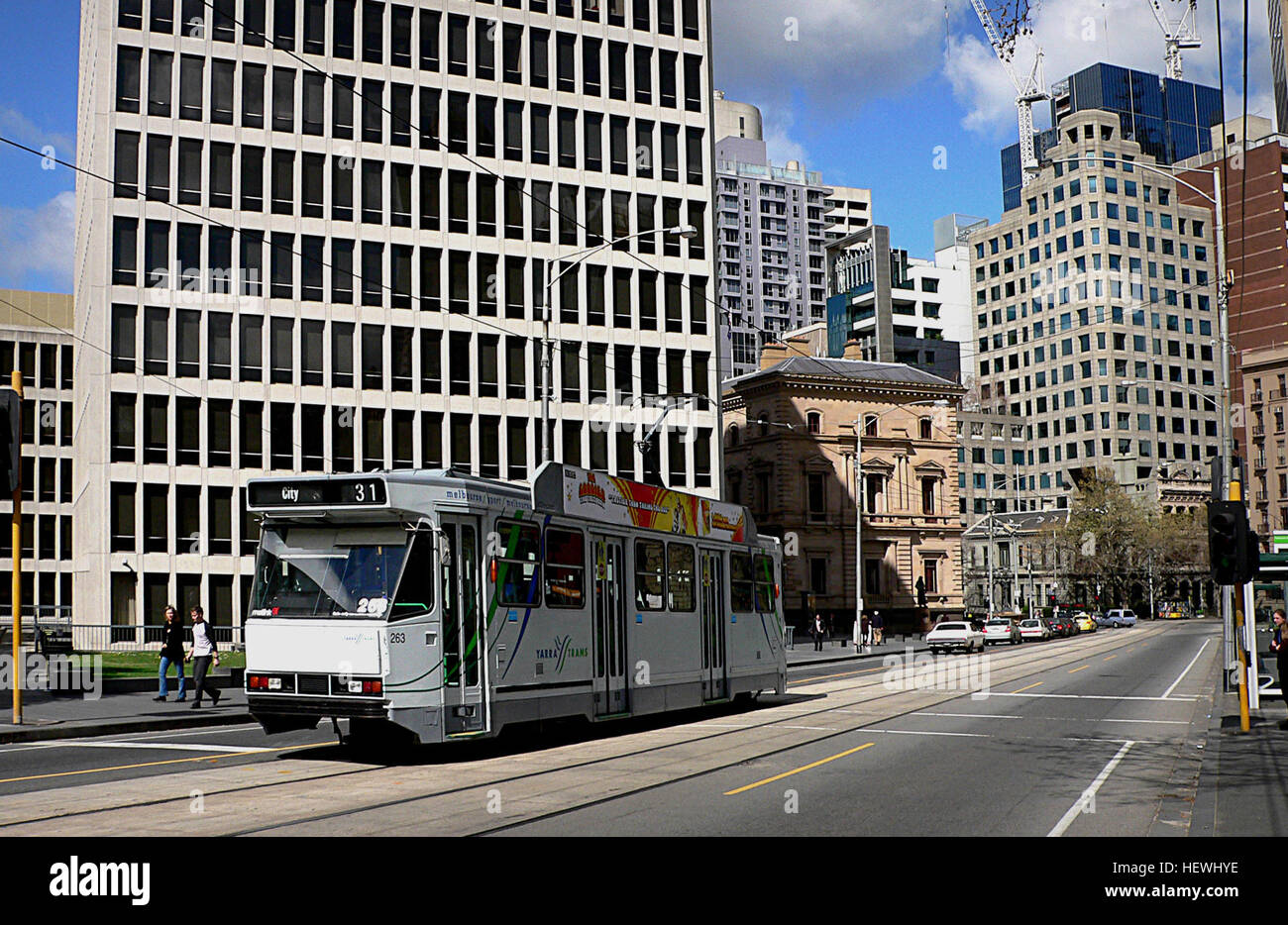 The Melbourne tramway network is a major form of public transport in Melbourne, the capital city of the state of Victoria, Australia. As of June 2011, the network consisted of 250 km (155.3 mi) of track, 487 trams, 30 routes, and 1,763 tram stops. It is the largest urban tramway network in the world,] ahead of the networks in St. Petersburg (240 km (150 mi)), Berlin (190 km (120 mi)), Moscow (181 km (112 mi)) and Vienna (172 km (107 mi)). Trams are the second most used form of public transport in overall boardings in Melbourne after the commuter railway network, with a total of 182.7 million p Stock Photo