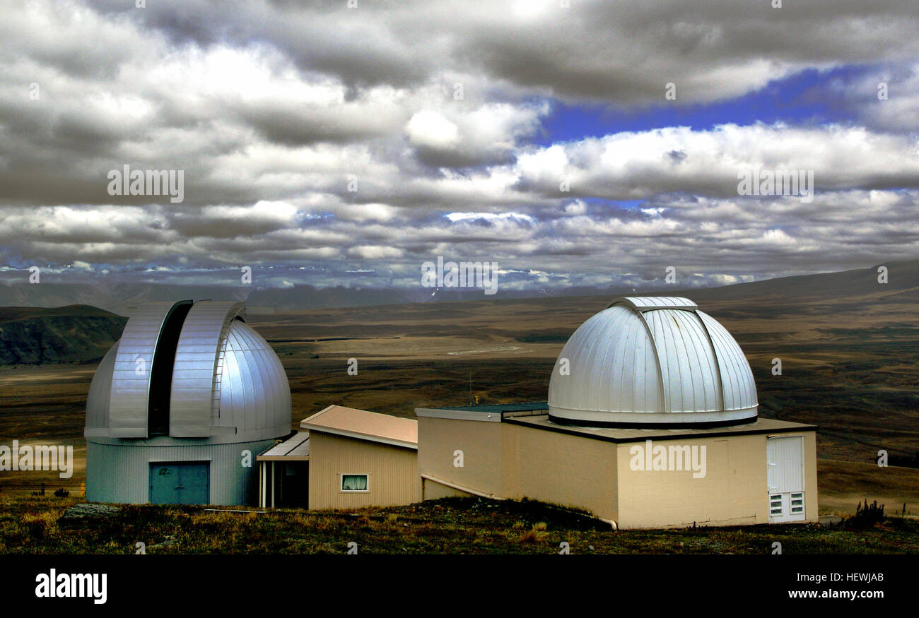 Mount John University Observatory (MJUO), is New Zealand's premier astronomical research observatory. It is situated at 1,029 metres (3,376 ft) ASL atop Mount John at the northern end of the Mackenzie Basin in the South Island, and was established in 1965 There are many telescopes on site including: one 0.4m, two 0.6m, one 1.0m, and a new 1.8m 'MOA Telescope' (see below) The nearest population center is the resort town Lake Tekapo (pop. &lt;500). Approximately 20% of nights at MJUO are photometric, with a larger number available for spectroscopic work and direct imaging photometry.  MJUO is op Stock Photo