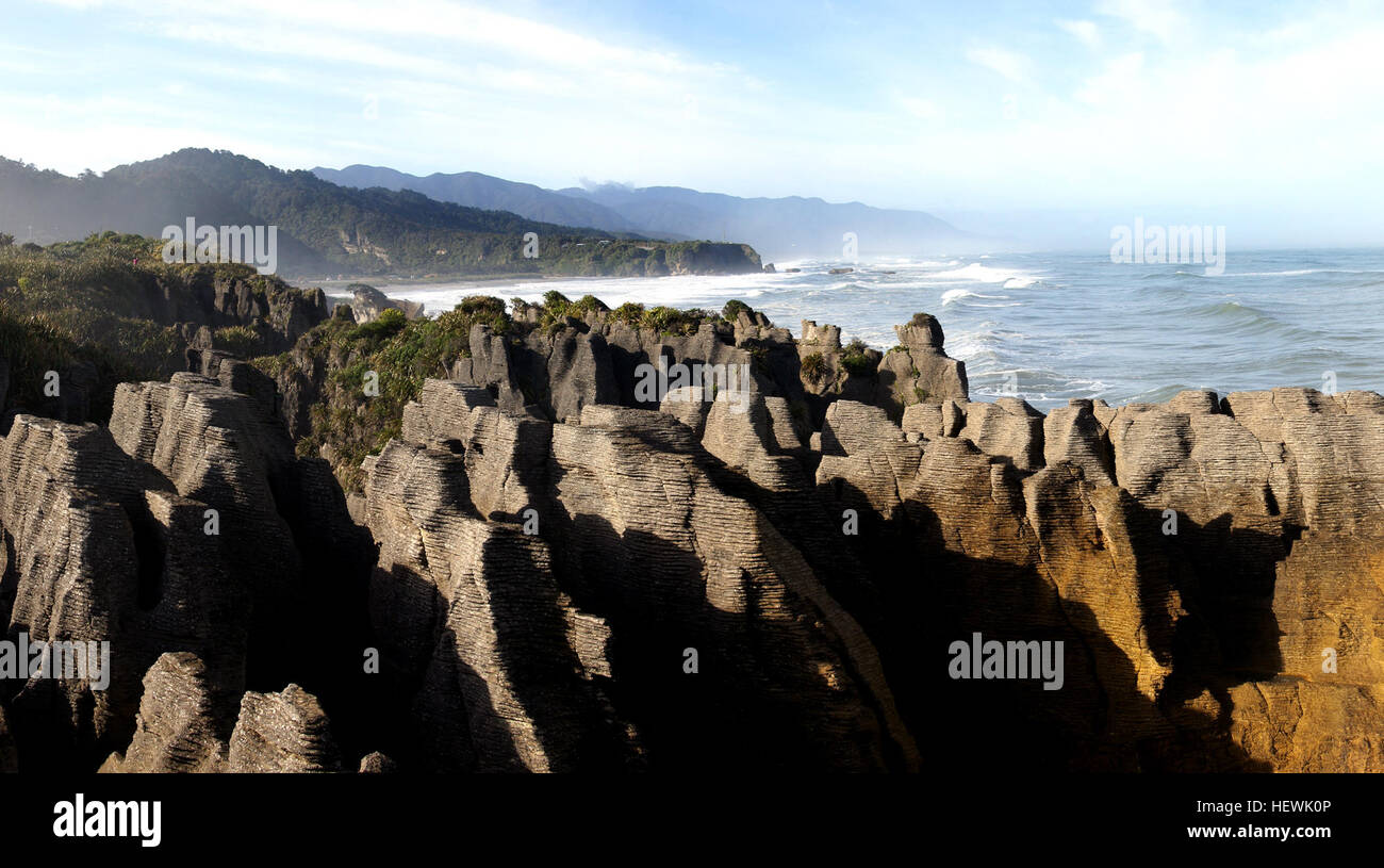 Pancake Rocks in New Zealand exhibit unique geological features, with ...