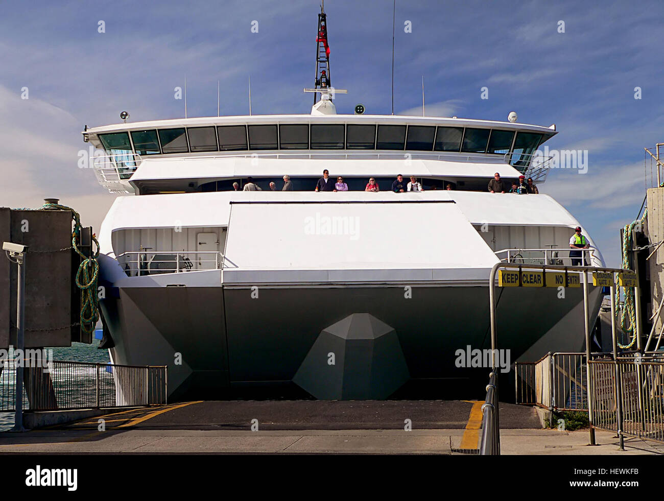 Overview  Searoad Ferries, the car and passenger ferry service, connects the Great Ocean Road and the Bellarine to the Mornington Peninsula Travelling between Sorrento and Queenscliff, the 40 minute crossing is a great way to experience the beauty of Melbourne's Port Phillip Bay and is a great alternative to the three hour drive around the Bay through city traffic.  Two specially designed all weather 60 metre ferries have easy drive on/drive off facilities, spacious comfortable lounges with full-length windows, a tempting cafe and plenty of deck space.  Dolphin spotting all year, whales in win Stock Photo