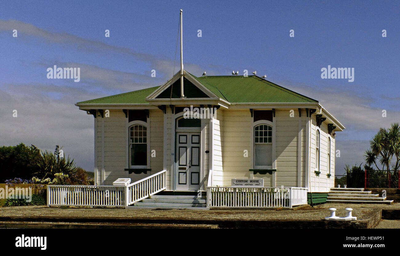 The Customhouse at Hokitika is one of the last remaining links to Hokitika's heyday as a busy and prosperous port. The establishment of Hokitika as a port-of-entry with a customs officer was a direct result of the West Coast gold rush, and the customhouse stands as a physical link to the history of extractive industries on the West Coast. The building is one of Campbell's earlier designs and part of an attempt by the government to standardise public buildings for ease and quickness of construction. As Campbell preferred to design and build in brick, the customhouse at Hokitika is an interestin Stock Photo