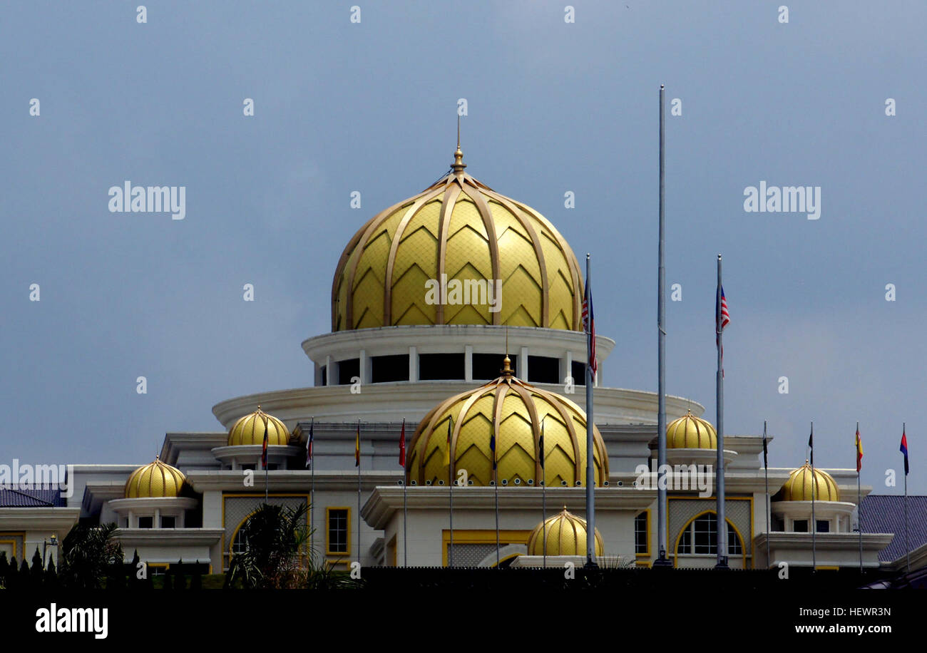 The King’s Palace or Istana Negara was built in 1928 and was originally the residence of a Chinese millionaire. During the Japanese occupation from 1942-1945, it was used as the Japanese officers’ mess. After the surrender of the Japanese, the building was bought by the Selangor State Government. It was then renovated to become the palace of His Majesty the Sultan of Selangor until 1957. Subsequently it was bought by the Federal Government to be turned into the Istana Negara for the Yang di Pertuan Agong, the Malaysian King. The area is fenced up and at the front of the gate are two guard post Stock Photo