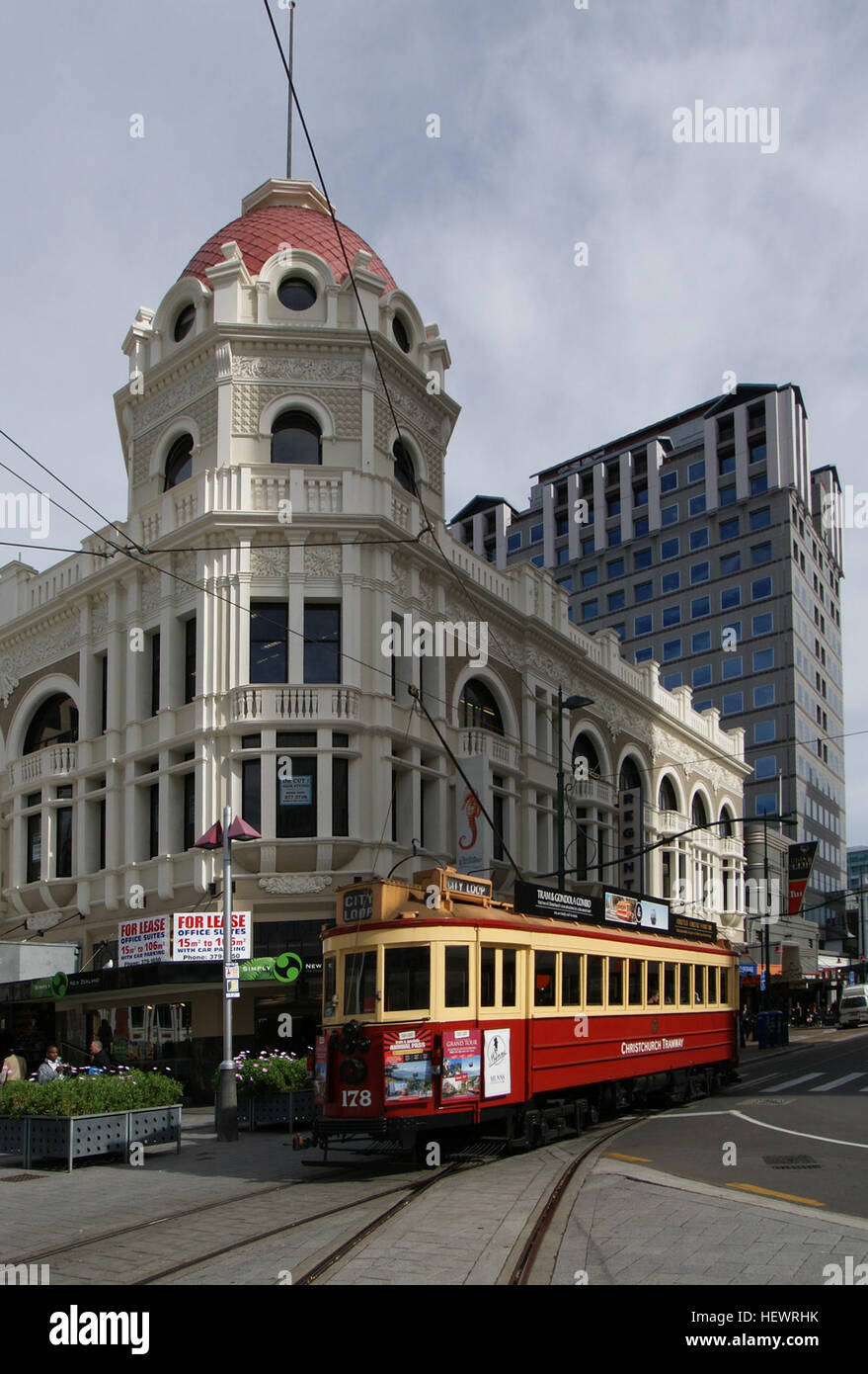 All of the buildings seen in this image are now gone as the result of the Christchurch earthquake. The trams are now back on there tracks. Stock Photo