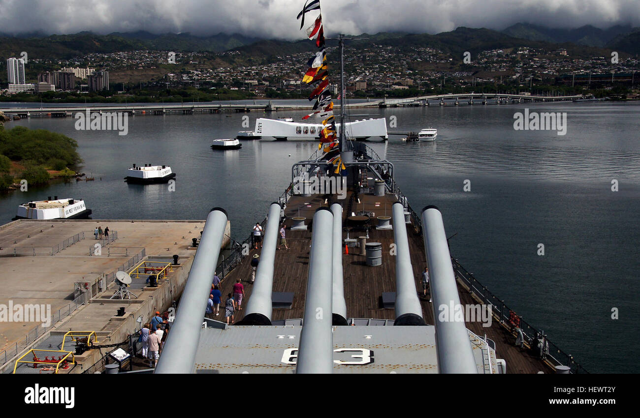 Weighing over 58,000 tons and measuring just under 900 feet from bow to stern, the USS Missouri is a hulking, awe-inspiring behemoth of a ship. A true force to be reckoned with in her prime, today, the now peaceful giant stands silent guard over Pearl Harbor. The "Mighty Mo" was the last American battleship ever built and the last to be decommissioned. The surrender of the Japanese on the deck of the Missouri brought the Second World War to an end and remains one of the most impressive highlights in her illustrious, 50-year career, spanning three wars, and three generations of Ameri Stock Photo