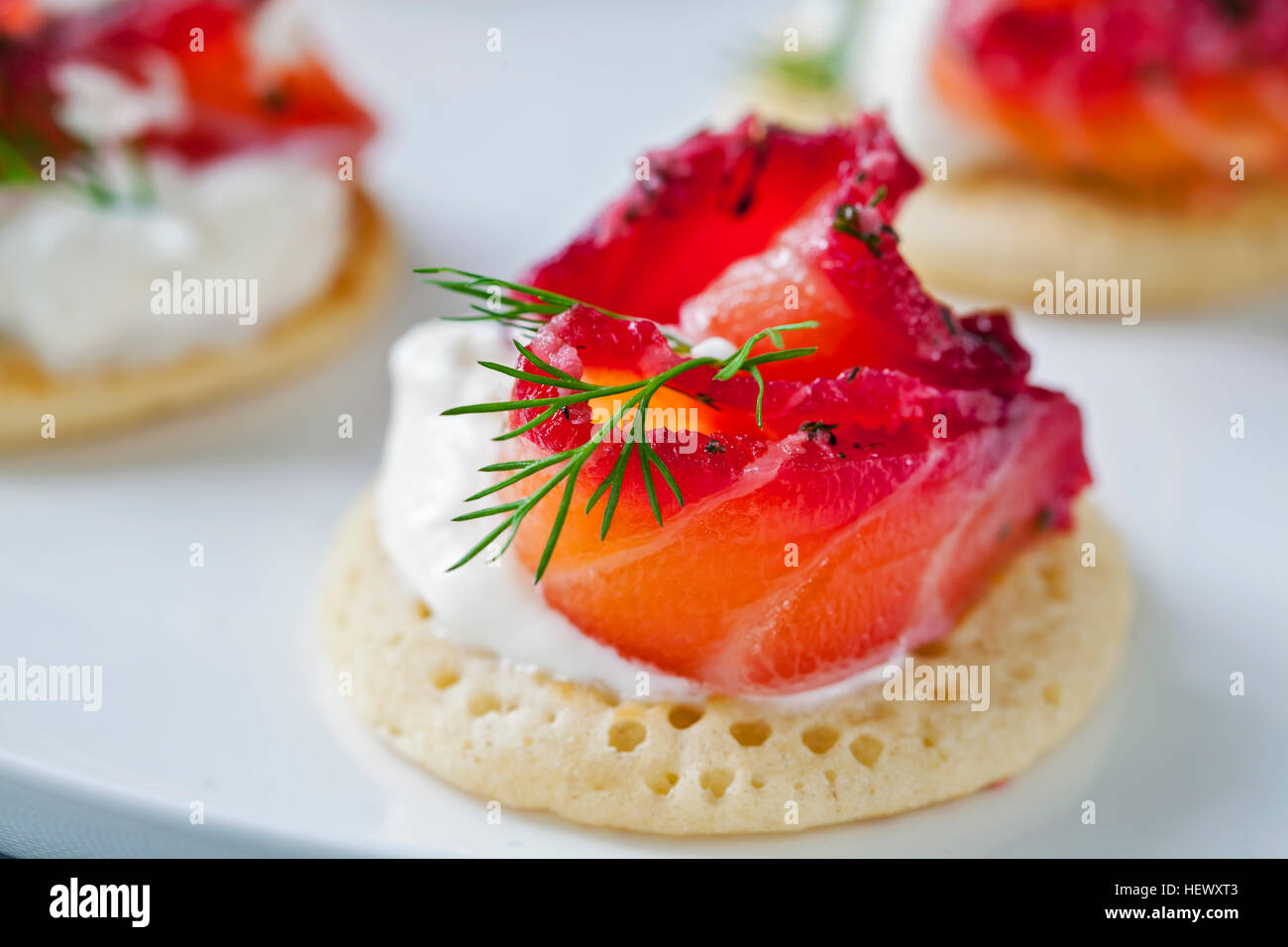 Party blinis with beetroot cured salmon, cream and horseradish Stock
