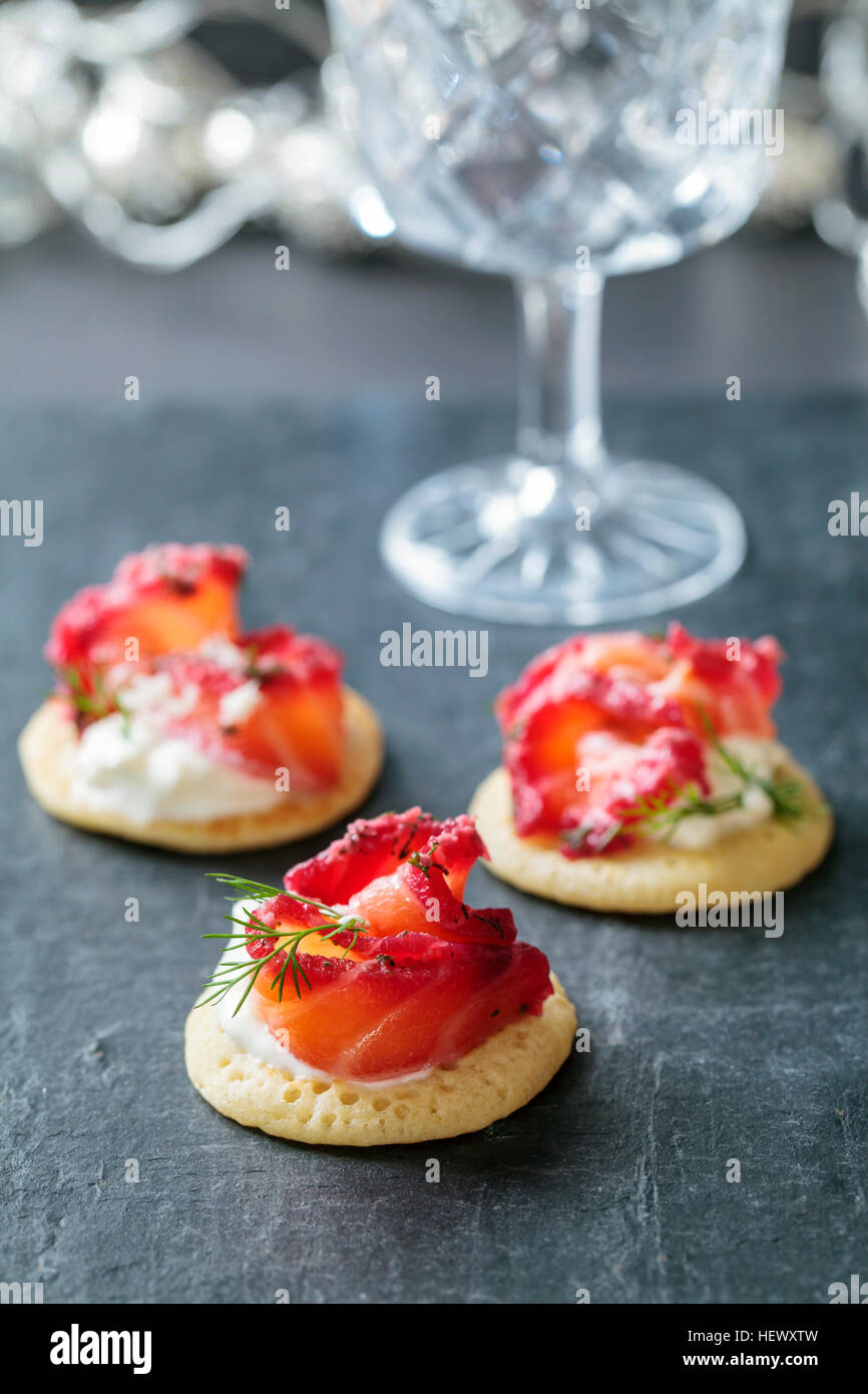 Party blinis with beetroot cured salmon, cream and horseradish Stock