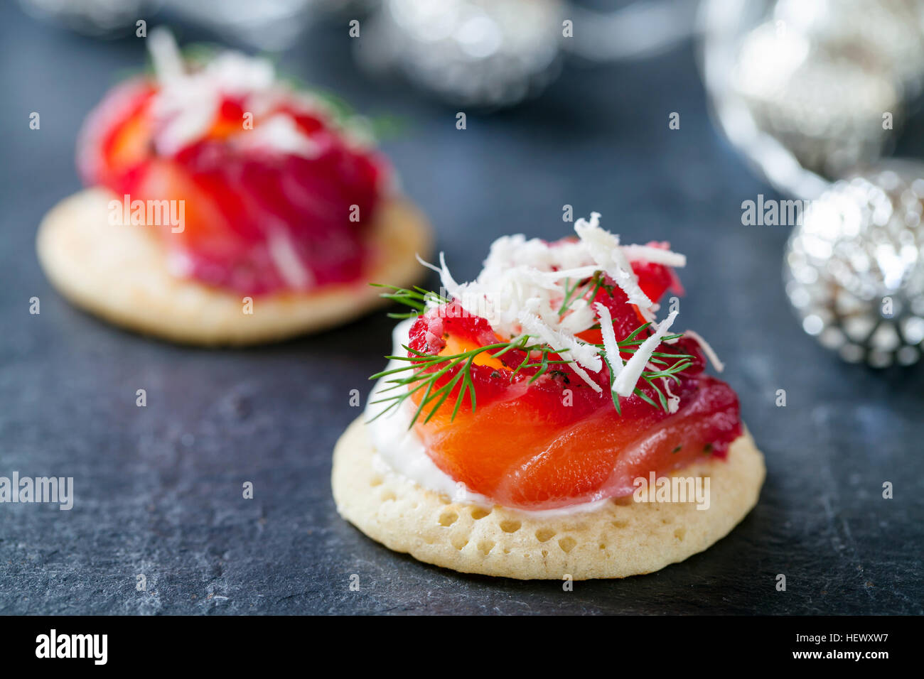 Party blinis with beetroot cured salmon, cream and horseradish Stock