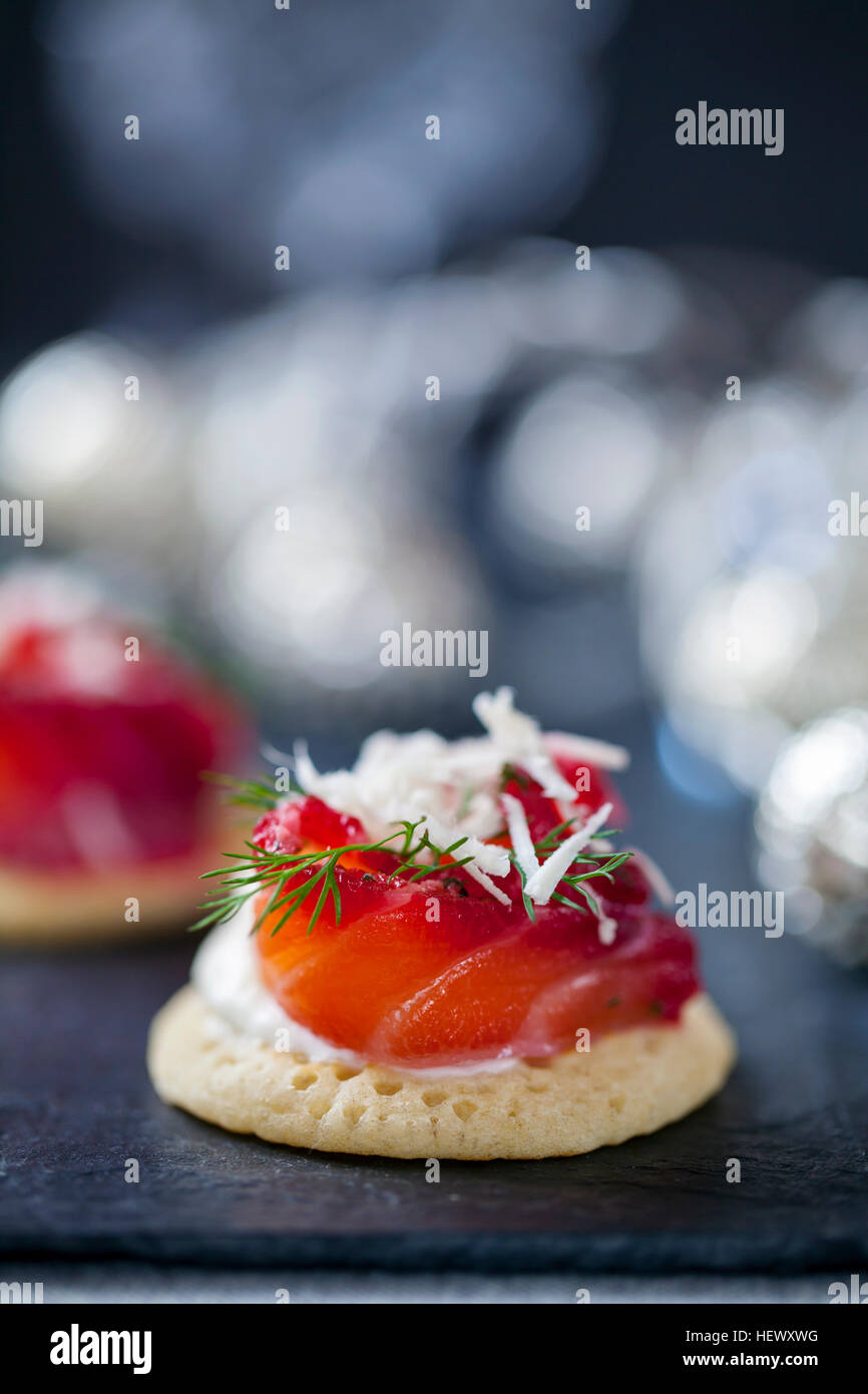 Party blinis with beetroot cured salmon, cream and horseradish Stock