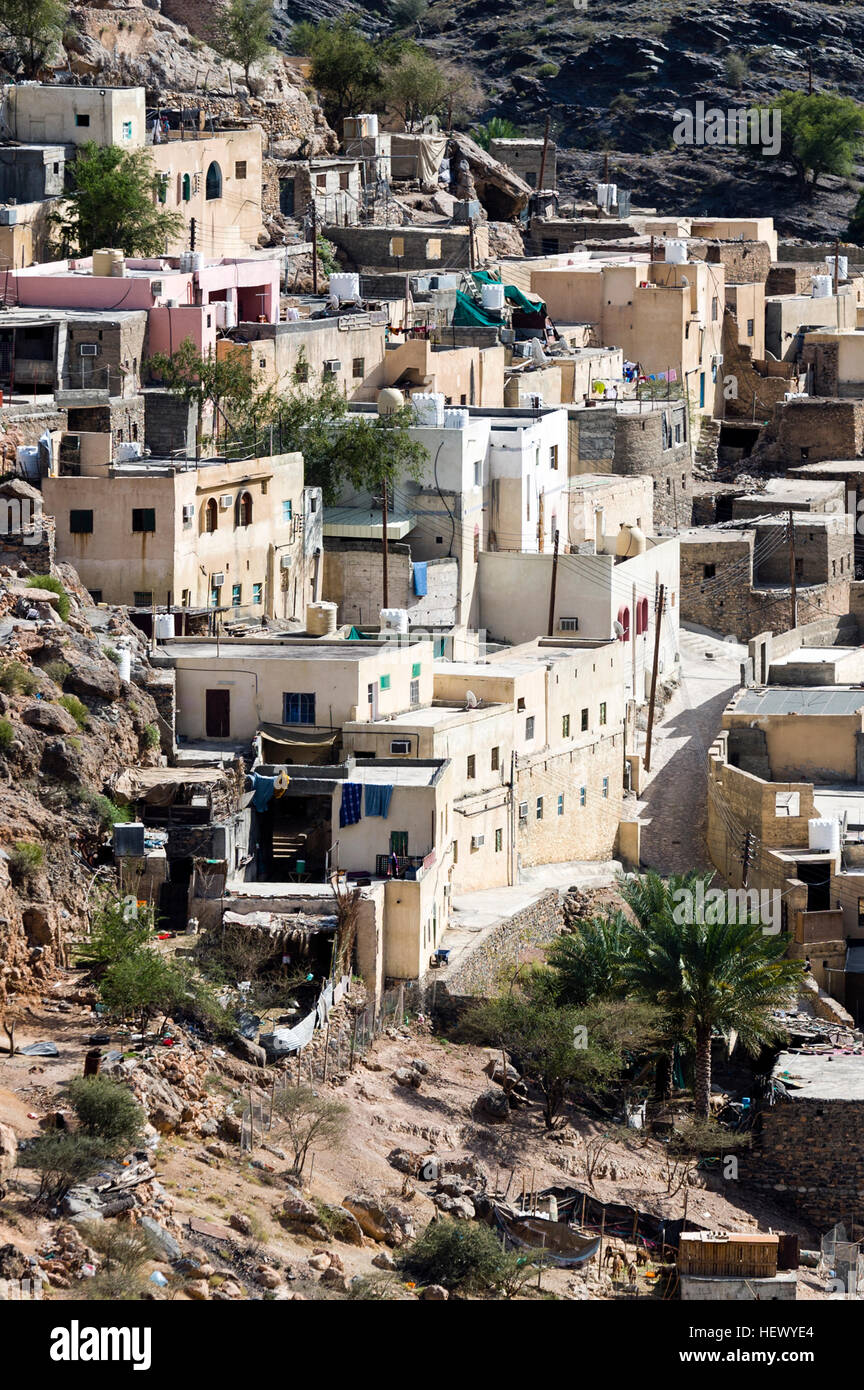 A mountain village stacked on terraced streets in a desert mountain valley. Stock Photo