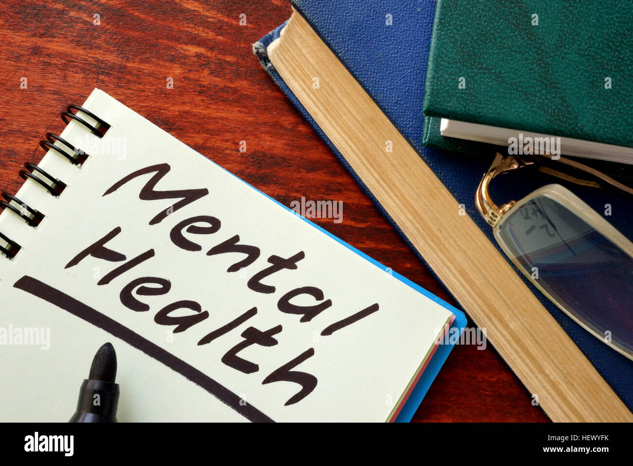 Mental Health written in a note.  Psychotherapy concept. Stock Photo