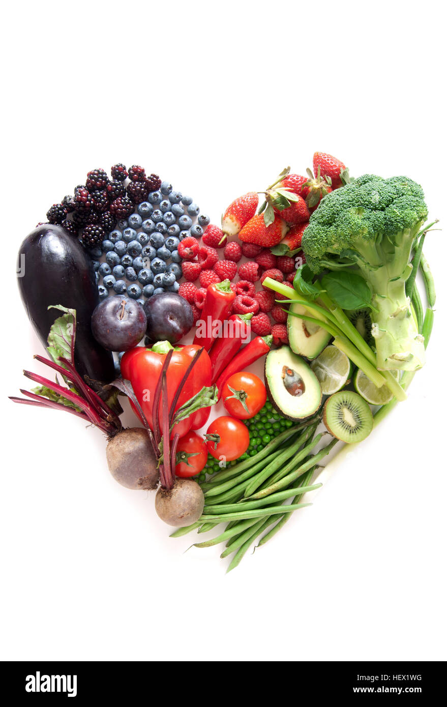 Heartshape fruits and vegetables with different color groups Stock Photo