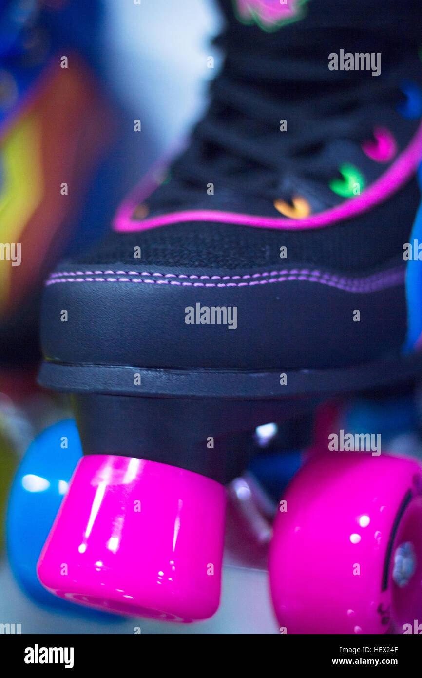 Childrens quad skate rollerskates in skate store in shop window display