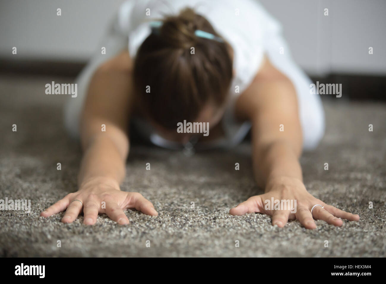 Woman sitting in Child exercise Stock Photo