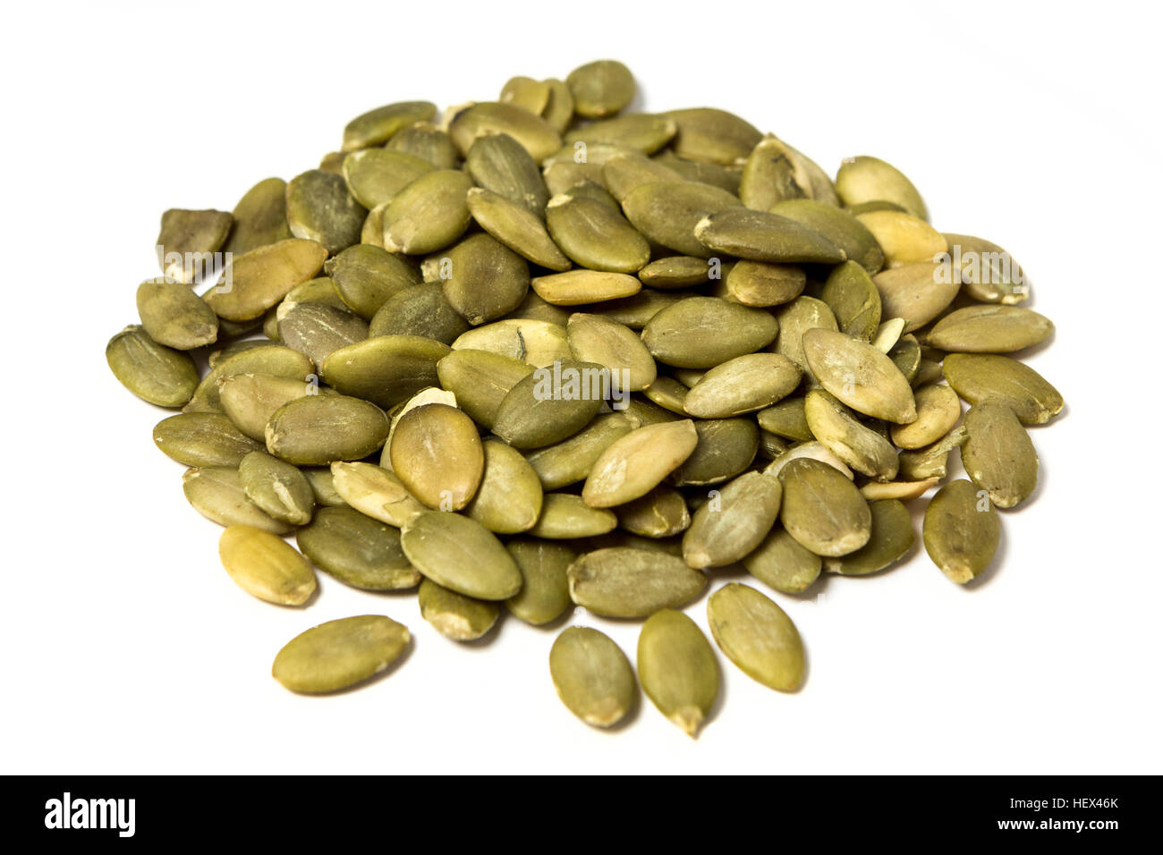Unshelled pumpkin seeds isolated on white background Stock Photo Alamy