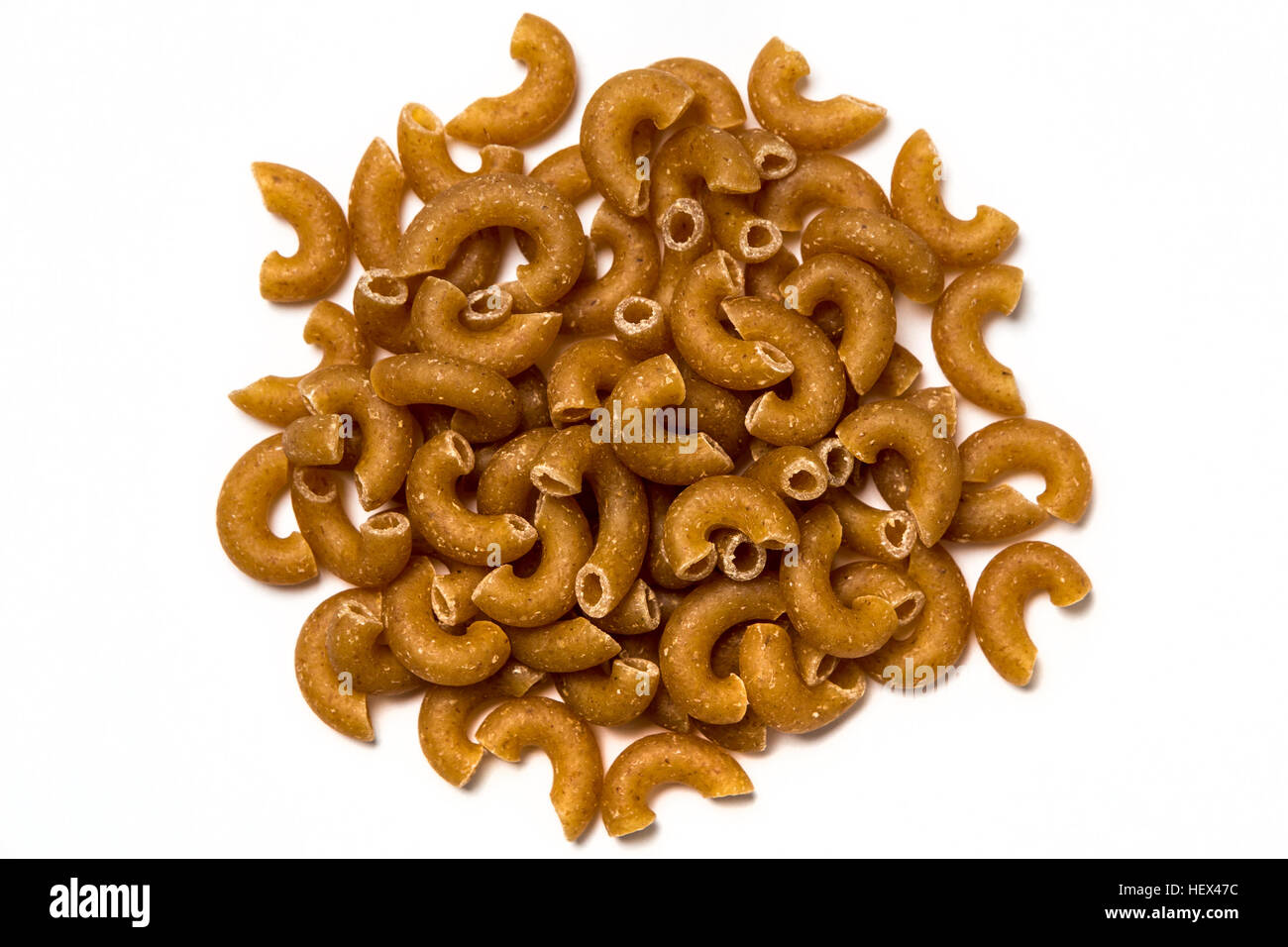 Whole wheat pasta isolated on white background Stock Photo Alamy