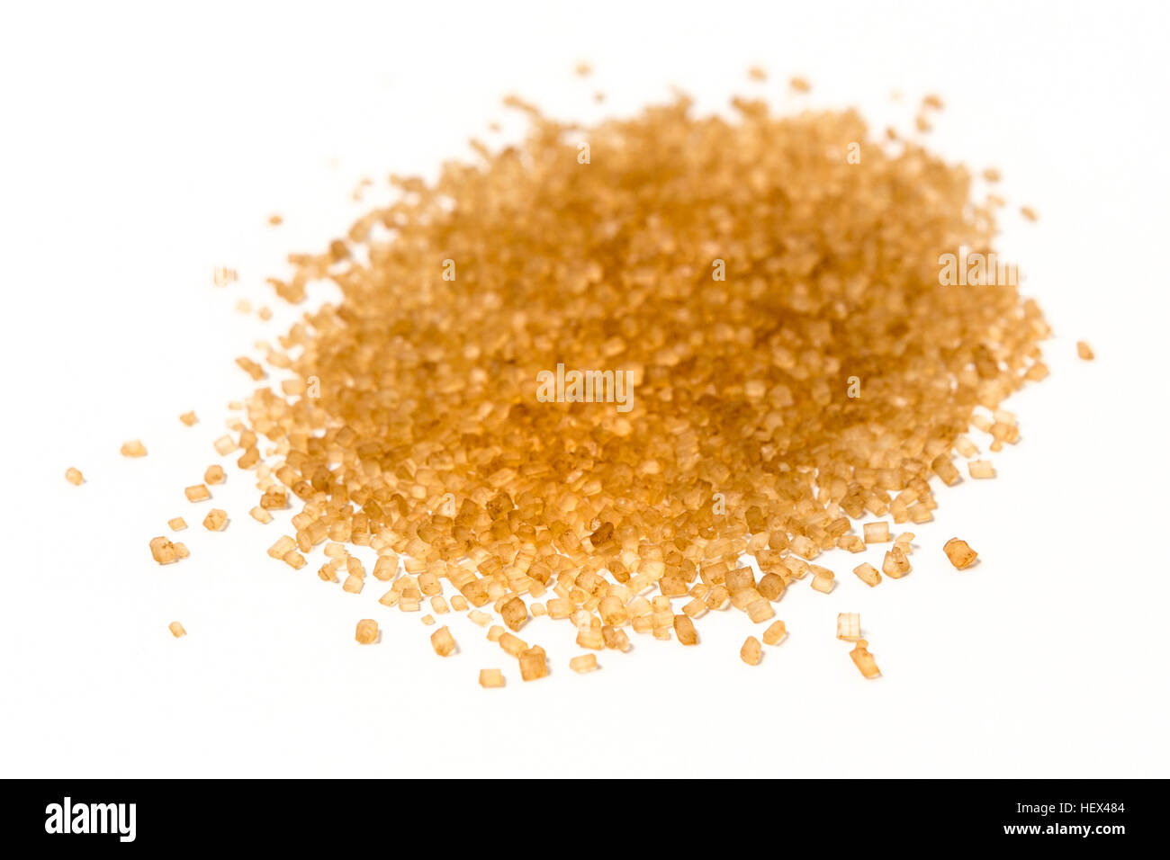 Golden turbinado sugar isolated on white background Stock Photo Alamy