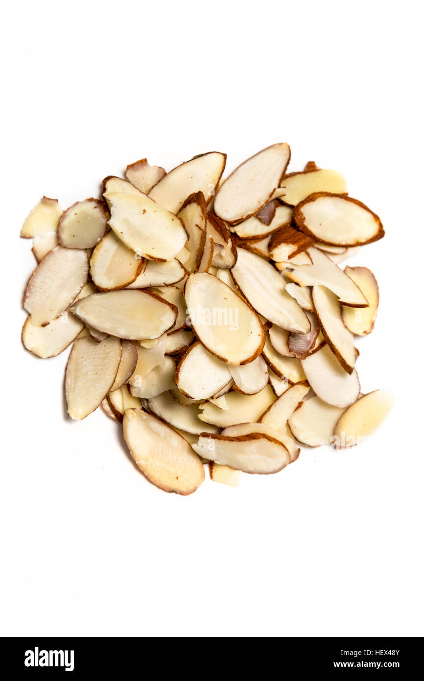 Pile of sliced almonds isolated on white background Stock Photo Alamy