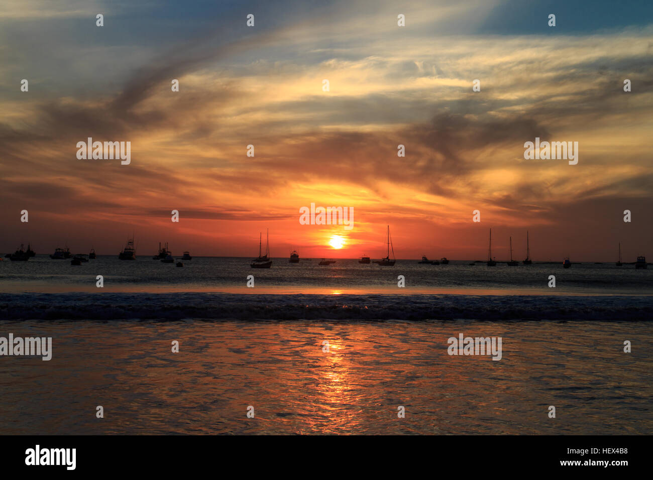 sunset on beach Stock Photo - Alamy
