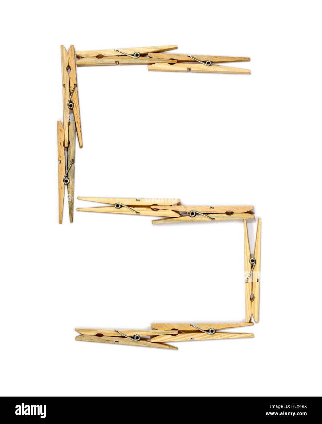 Letter S made of wooden clothespins isolated on white Stock Photo Alamy