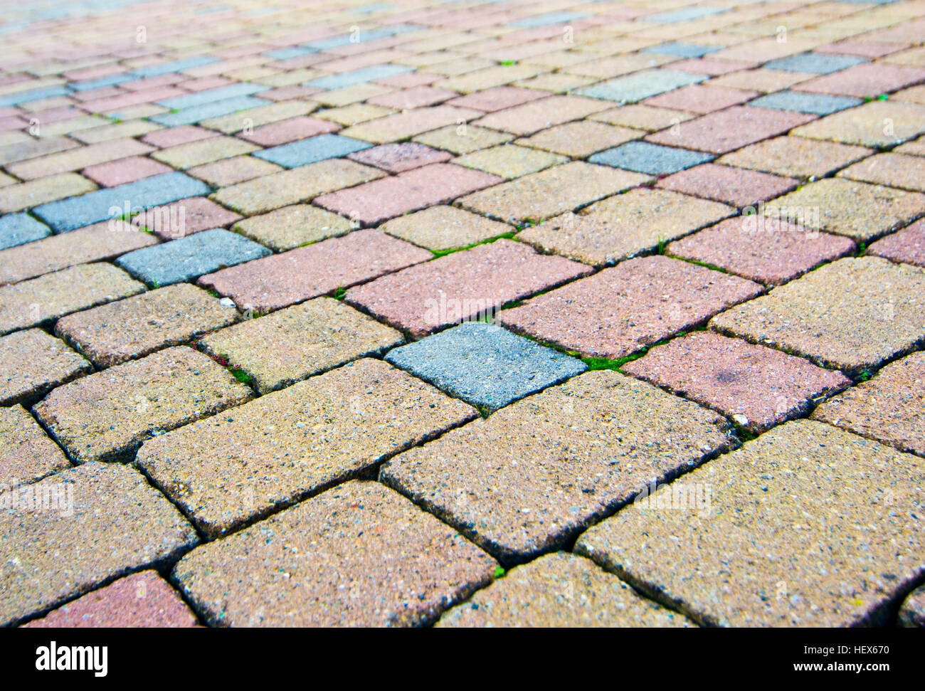 paving stone bricks of different colors and of irregular composition Stock Photo