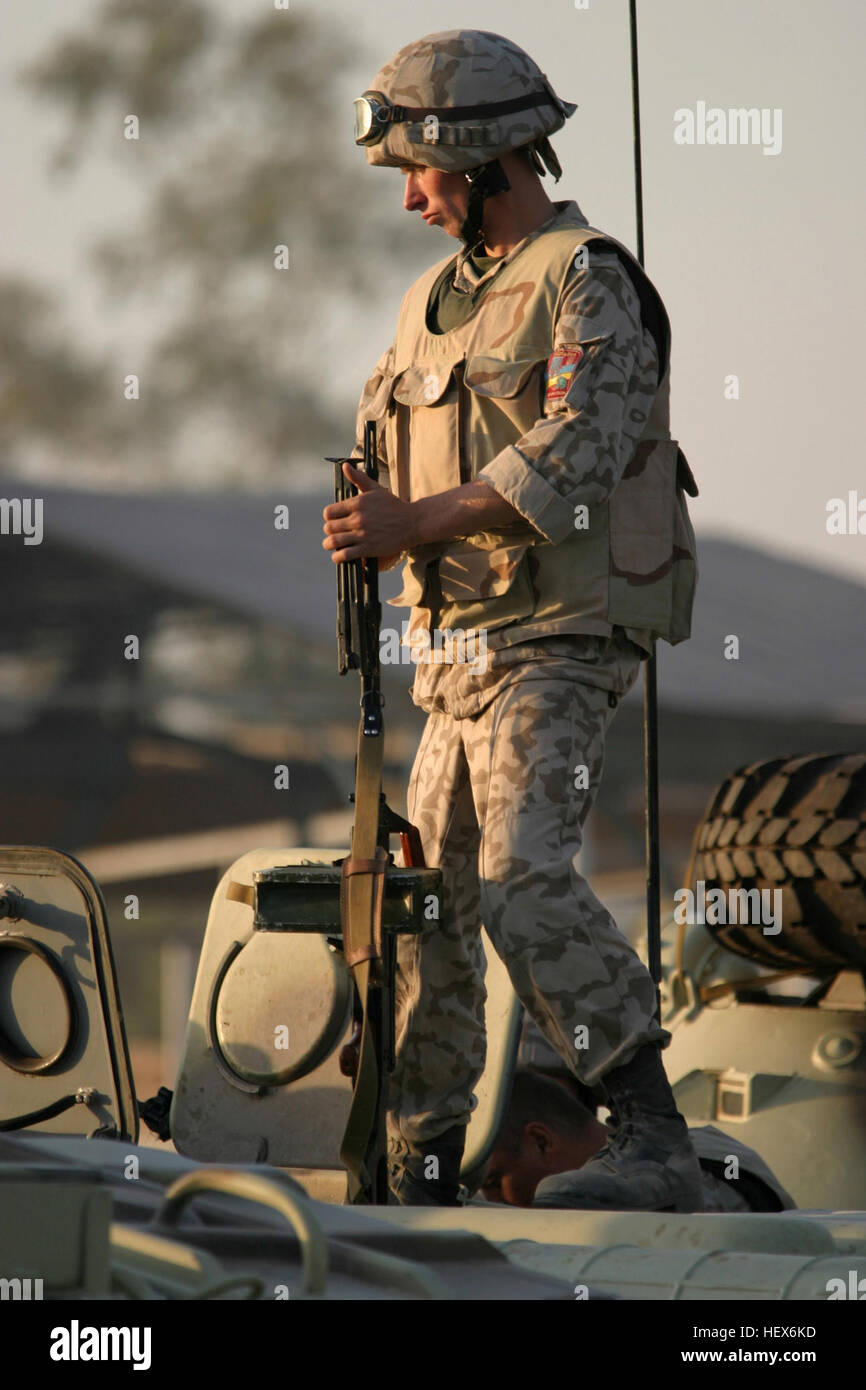 A Ukrainian Army Soldier holds a 7.62mm PKM light machine gun as he