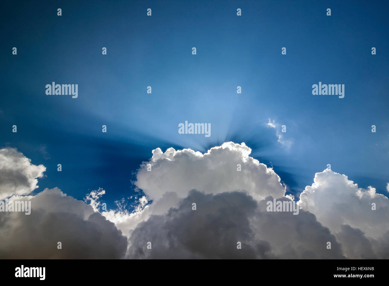 Blue sky with puffy white clouds in bright clear sunny day Stock Photo ...