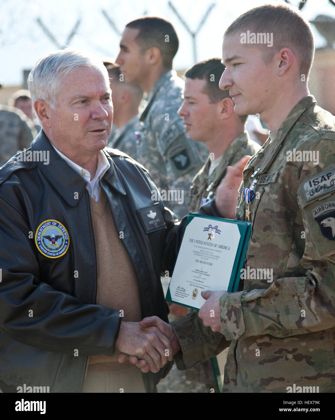 U.S Army Cpl. Joshua Busch, 1st Battalion, 327th Infantry Regiment, is awarded the Silver Star Medal by the Secretary of Defense, the Honorable Robert Gates, Forward Operating Base Joyce, Konar province, Afghanistan, Dec. 7, 2010.  The Silver Star was awarded for valorous actions against armed and heavily fortified enemy during Operation Strong Eagle. (Photo by: Spc. Andy Barrera) Flickr - DVIDSHUB - Soldiers Bestowed Medals by Secretary of Defense (Image 3 of 7) Stock Photo