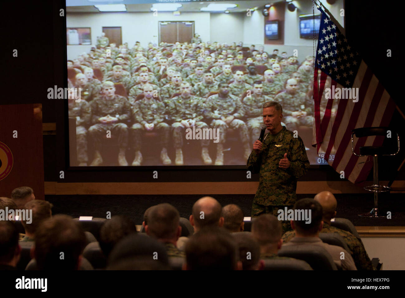 Commandant of the Marine Corps, Gen. James F. Amos, speaks to the Marines, Sailors and civilians of Marine Corps Forces, Special Operations Command to include the MARSOC Marines on the West Coast during a visit to MARSOC headquarters on Camp Lejeune, Jan. 18, 2011. He spoke regarding the future of MARSOC, reinforcing Marine Corps culture and heritage and his guidance for Marines to embrace MARSOC as it enters its fifth year. Toward the end of the visit, time was allowed for the floor to be open for questions. (U.S. Marine Corps photo by Cpl. Thomas W. Provost/Released) Commandant of the Marine Stock Photo