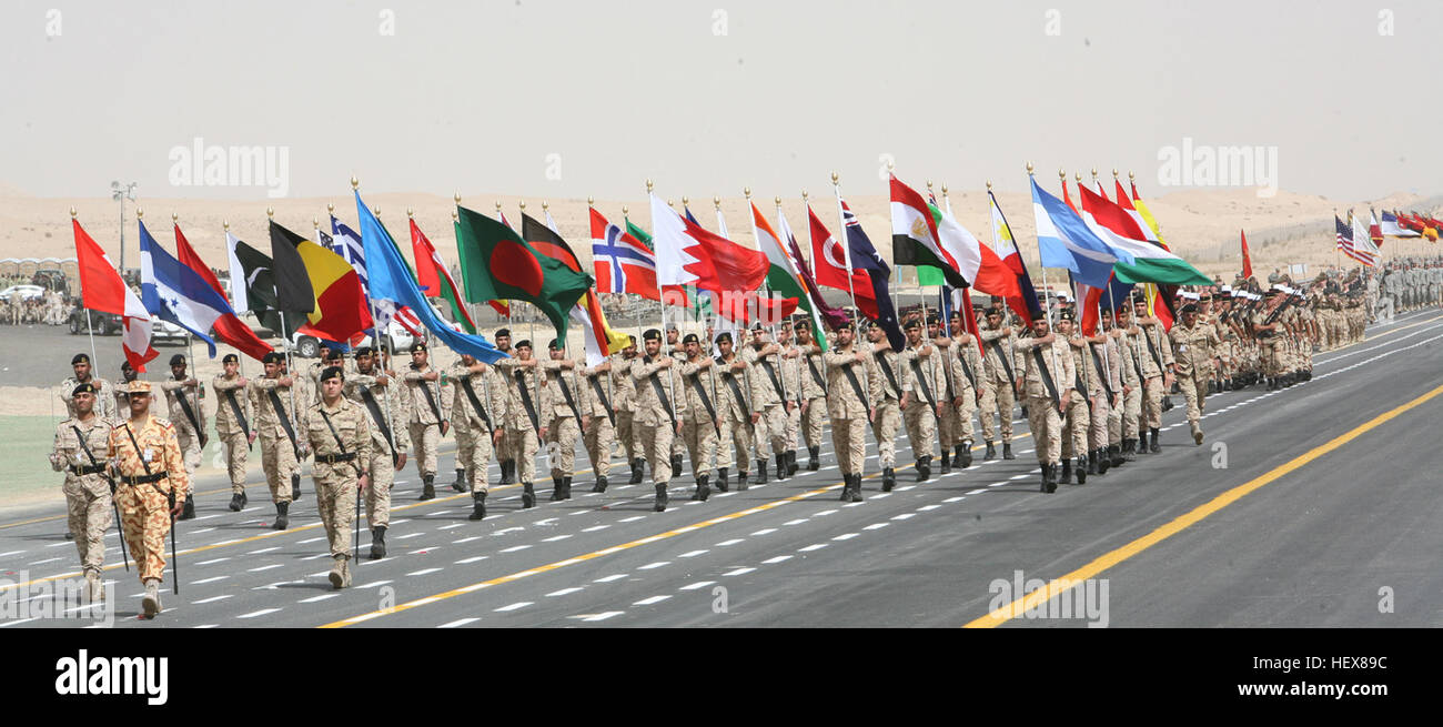Members of the Kuwait Army hold country colors during the 50/20