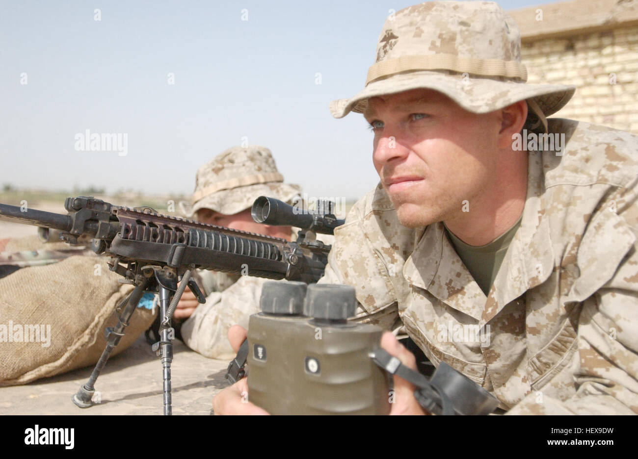 Navy Petty Officer 3rd Class Jeff L. Pursley (foreground), a Corpsman ...