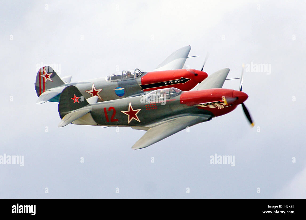 The Yakovlev Yak-3  was a World War II Soviet fighter aircraft. Robust and easy to maintain, it was much liked by pilots and ground crew alike. It was one of the smallest and lightest major combat fighters fielded by any combatant during the war, and its high power-to-weight ratio gave it excellent performance. It proved a formidable dogfighter. Marcel Albert, the official top-scoring World War II French ace, who flew the Yak in USSR with the Normandie-Niémen Group, considered it a superior aircraft to the P-51D Mustang and the Supermarine Spitfire.  After the war ended, it flew with the Yugos Stock Photo