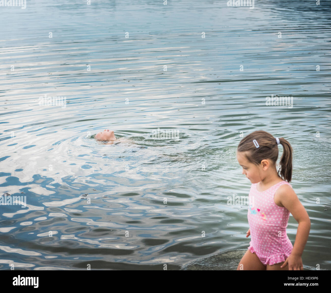 Brother and sister at lake Stock Photo Alamy