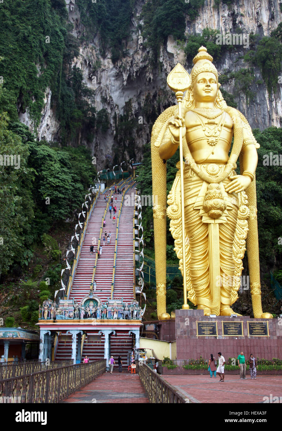 Asia,Batu Caves,Hindu,Kuala,Lumpur,Malaysia,Statures,Tour,caves,gold,monkeys,steps,temple Stock Photo