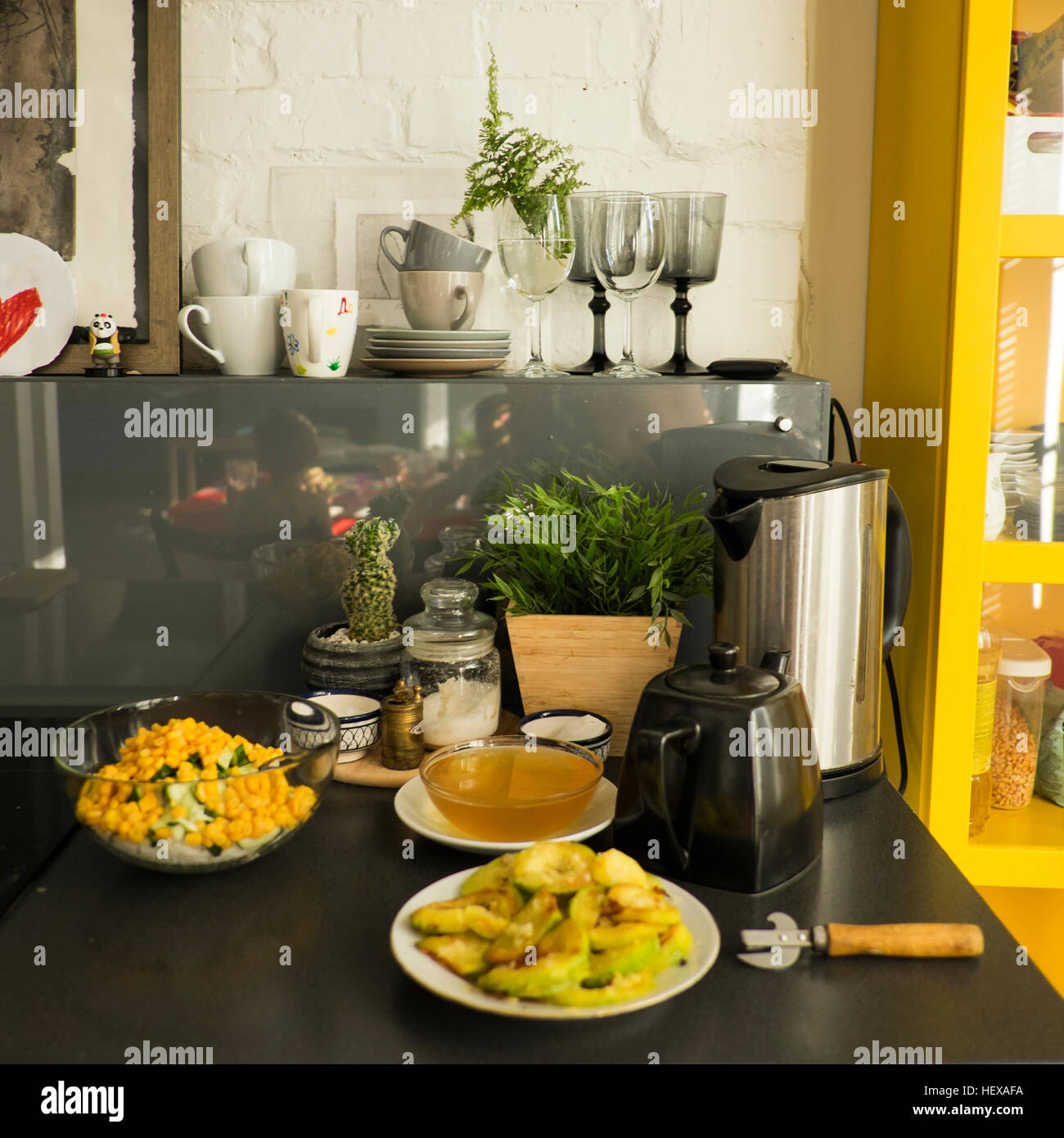 Kitchen interior, showing kitchen work surface with fried zucchini
