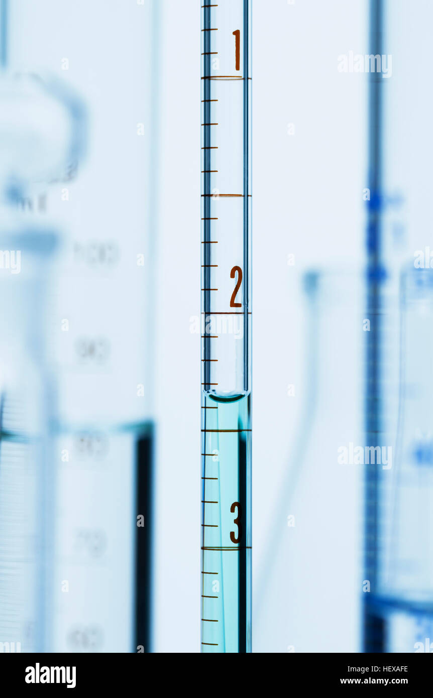 Meniscus. Curved surface of water in graduated pipette. Liquid volume measured by reading scale at the bottom of the meniscus Stock Photo