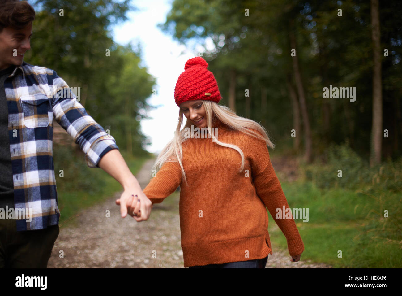 Couple holding hands walking hi-res stock photography and images - Alamy