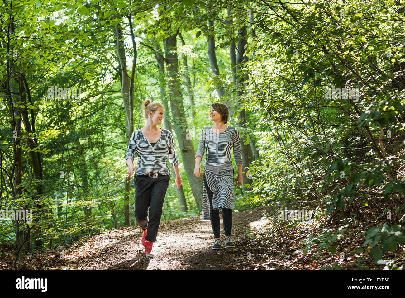 Two mature women walking in hi-res stock photography and images - Alamy