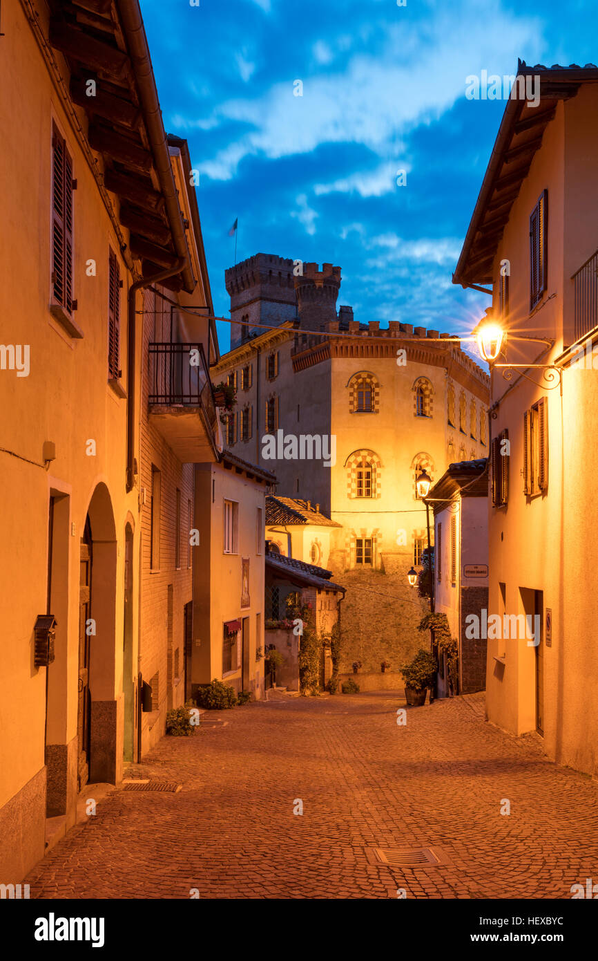 Twilight over medieval town of Barolo with Museo del Vino a Barolo beyond, Piemonte, Italy Stock Photo